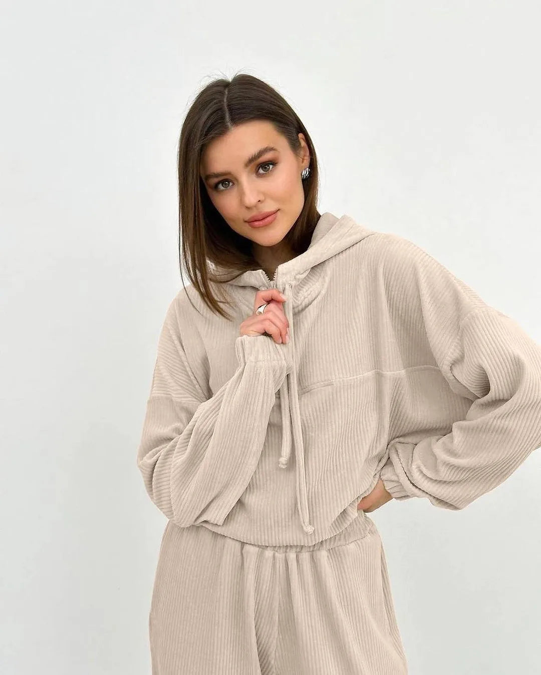 Women's two-piece set with hood and long sleeves