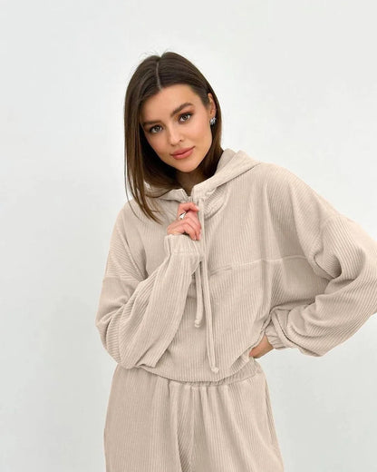 Women's two-piece set with hood and long sleeves