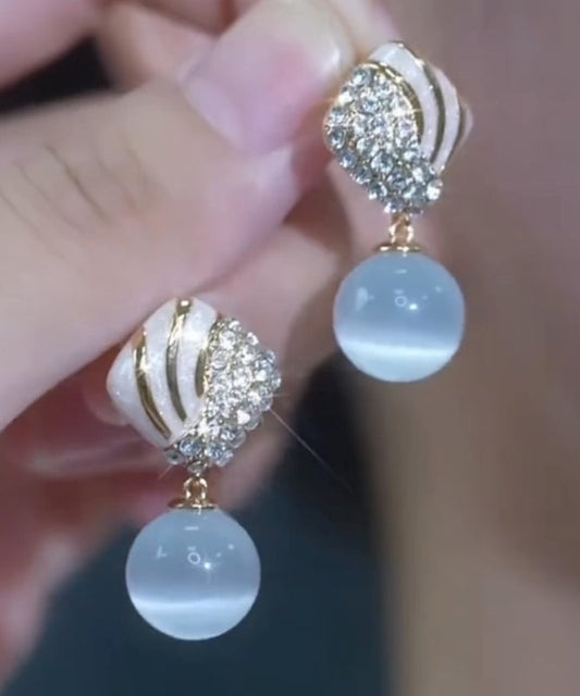 Boucles d'oreilles pendantes élégantes en alliage bleu clair avec pierre œil de chat en zircon - TrendAura