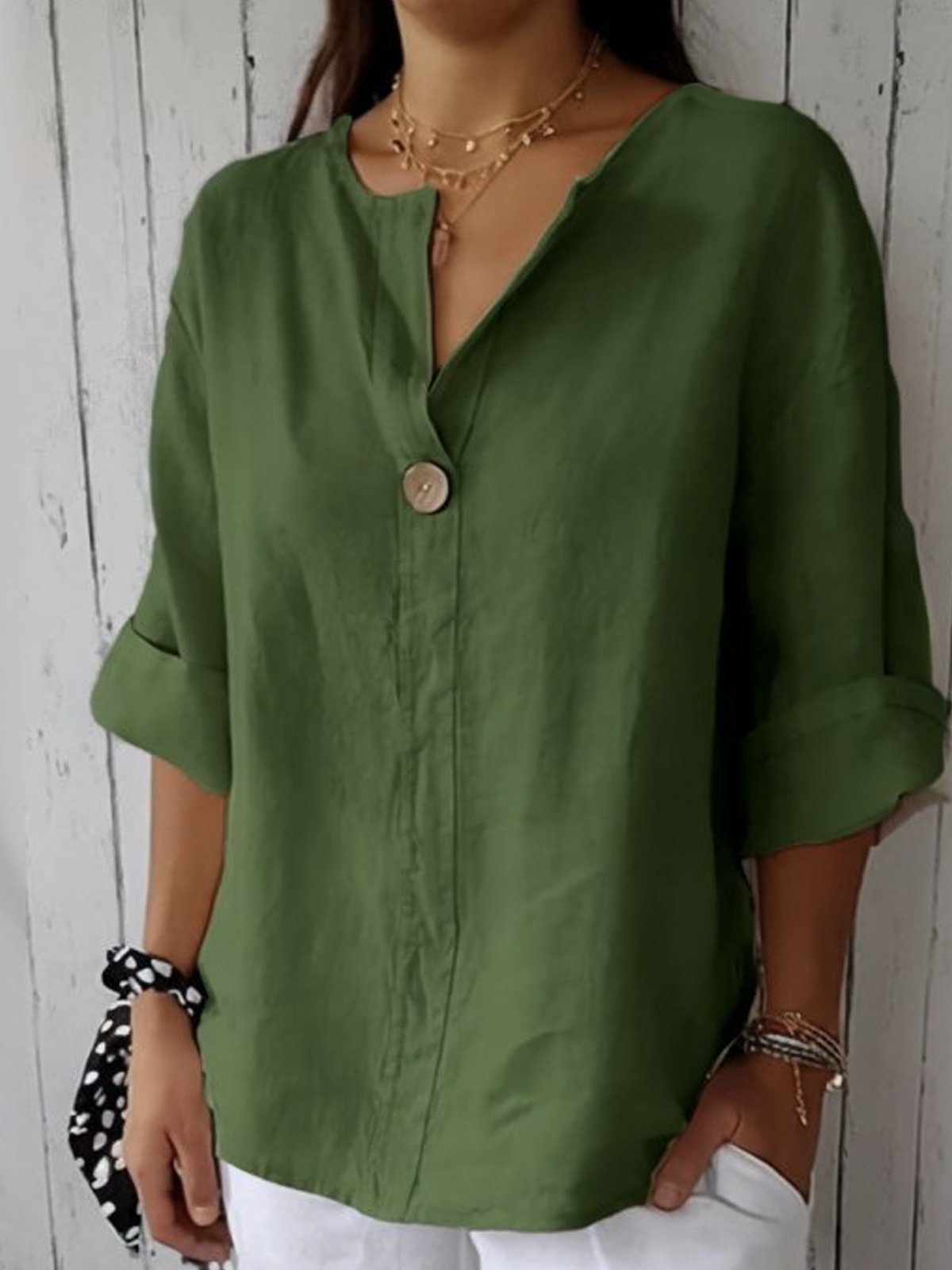 Elegant women's linen blouse with V-neckline