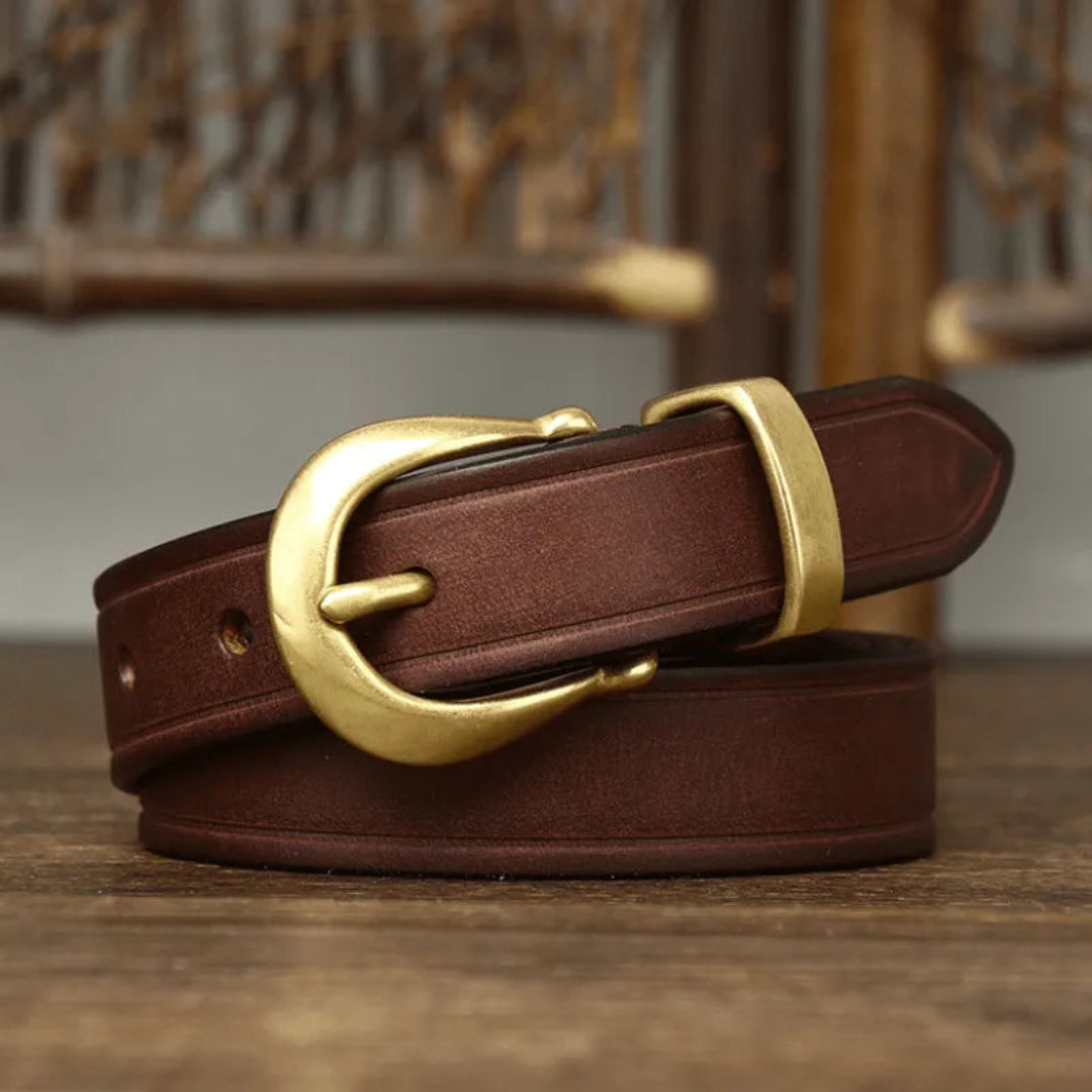 Elegant belt made of full-grain leather with curved brass buckle