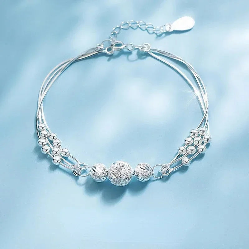 Elegant bracelet for women with star pendant and blue crystal beads