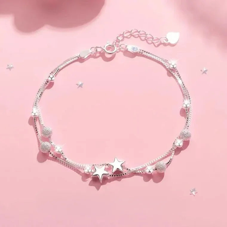 Elegant bracelet for women with star pendant and blue crystal beads