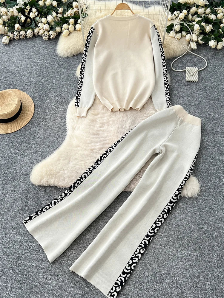 Elegant women's knit set with pullover and wide-leg pants