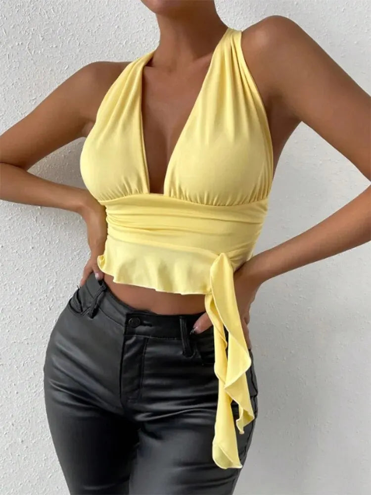 Elegant women's top with deep V-neck and pleats
