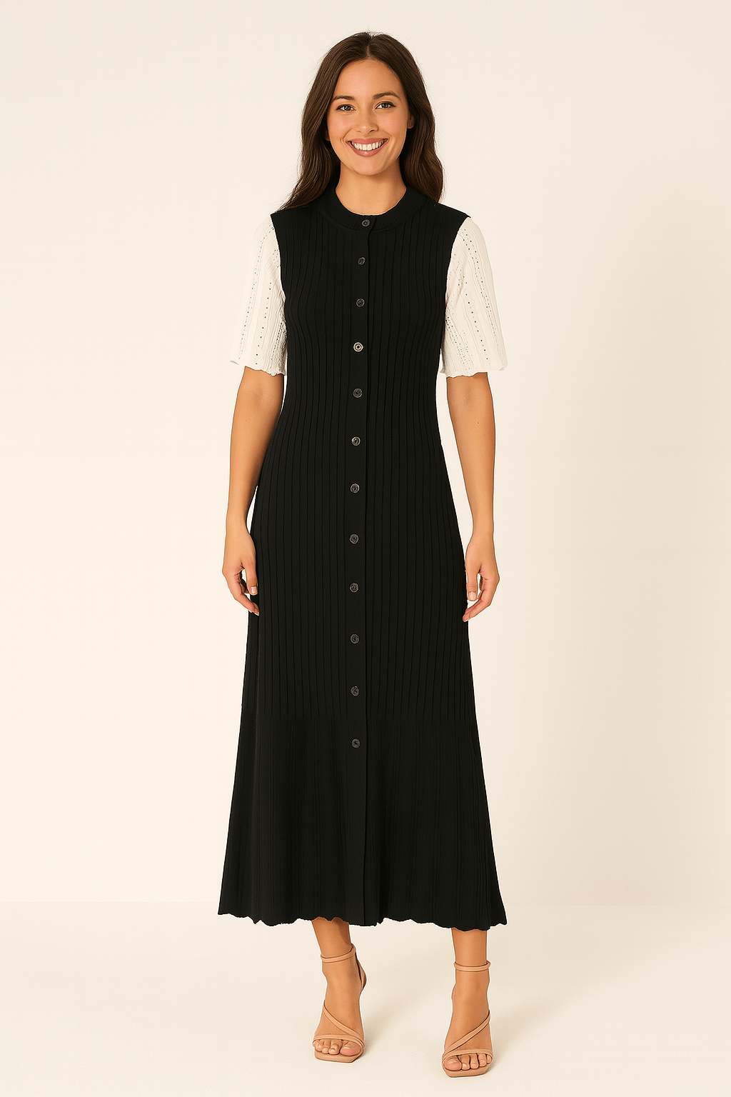 Elegant knitted maxi dress with button placket and eyelet pattern