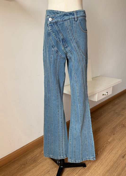 Pantalon évasé en denim bleu à poches asymétriques pour l'automne - TrendAura