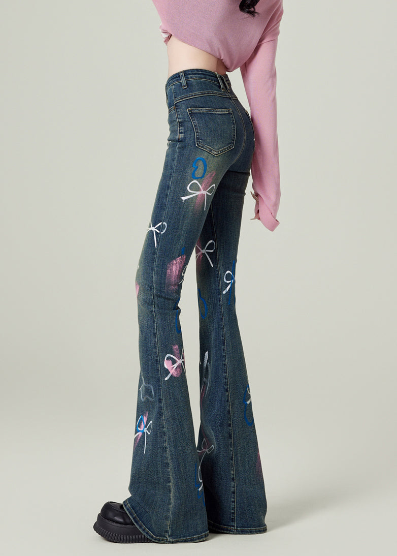 Pantalon évasé en denim bleu à poches et nœuds pour le printemps - TrendAura