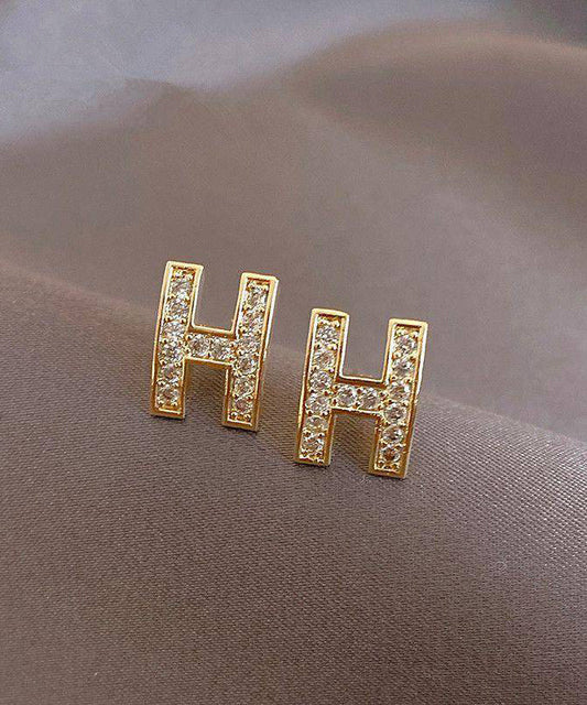 Boucles d'oreilles à tige tendance en alliage d'or et zircon avec motif graphique H - TrendAura