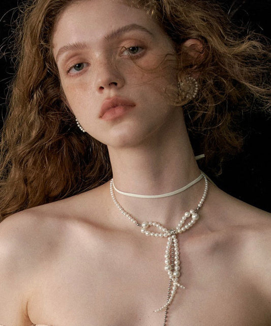 Collier à double pendentif en alliage blanc avec nœud en perles et pompon - TrendAura