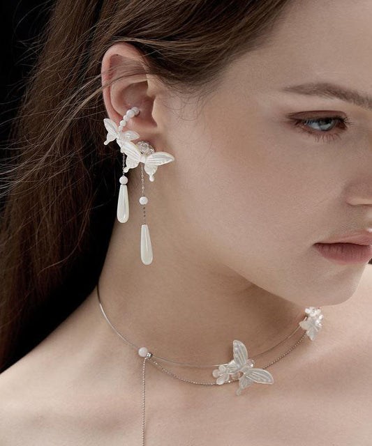 Boucles d'oreilles pendantes en argent sterling blanc avec perles et papillon - TrendAura