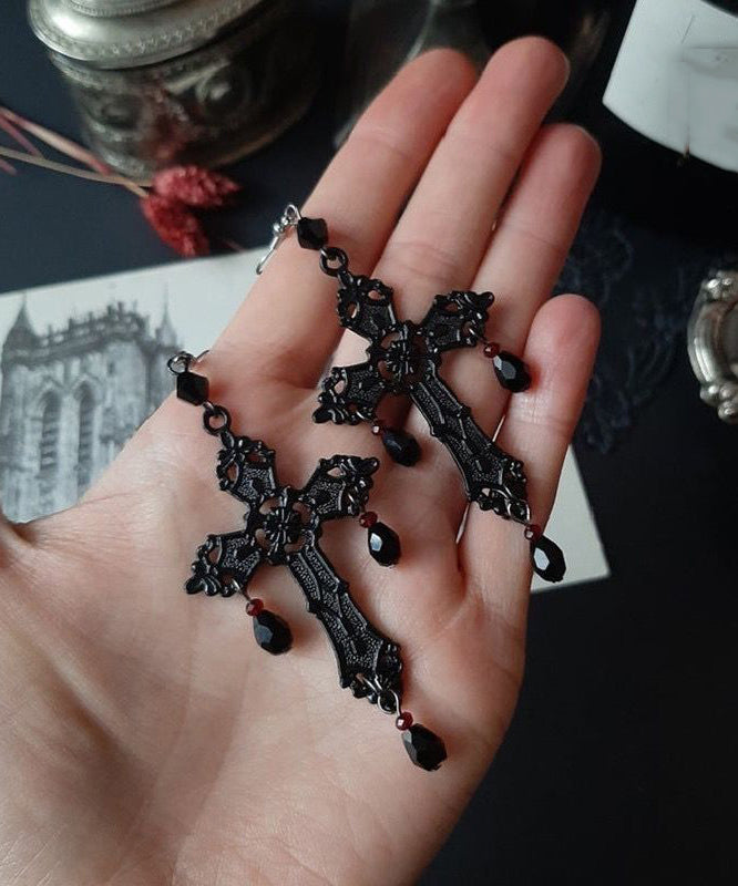Boucles d'oreilles pendantes à pampilles croisées en acier inoxydable noir fin - TrendAura