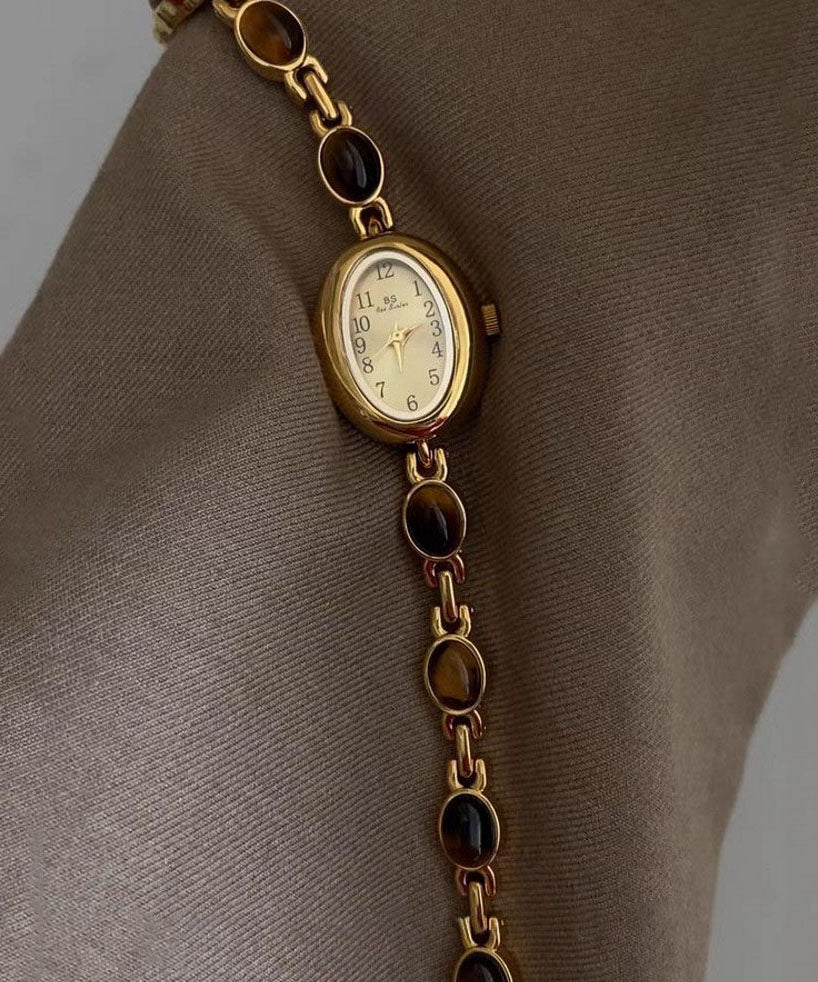 Montres à mouvement à quartz en verre trempé et alliage métallique doré fin - TrendAura