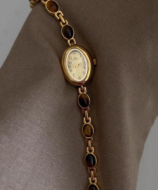 Montres à mouvement à quartz en verre trempé et alliage métallique doré fin - TrendAura
