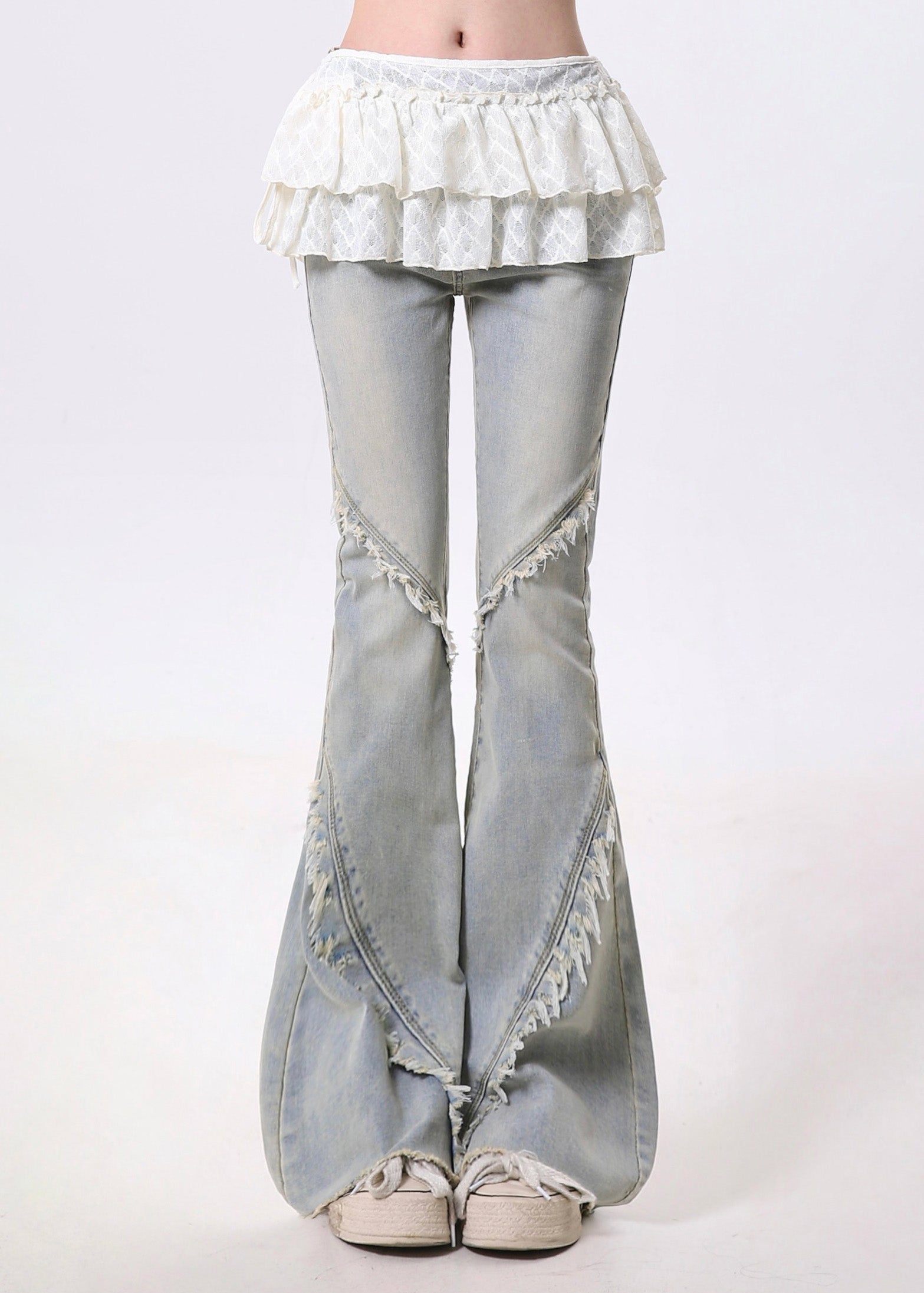 Pantalon en denim bleu clair italien à volants et à franges, style patchwork, à pattes d'éléphant, printemps - TrendAura