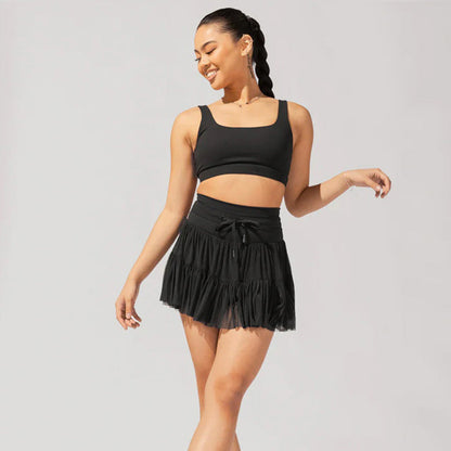 High-waisted mini skirt for women with pleats and integrated shorts
