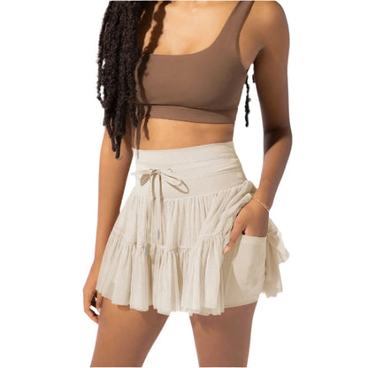 High-waisted mini skirt for women with pleats and integrated shorts