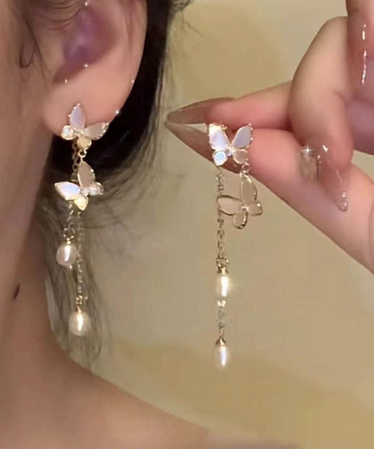 Boucles d'oreilles pendantes modernes en alliage de cuivre doré et perles, motif papillon et pompon - TrendAura