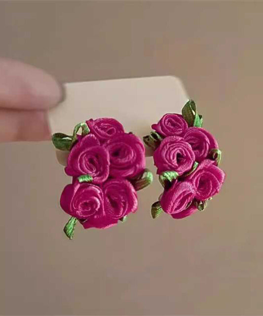 Boucles d'oreilles à tige modernes en tissu rose à fleurs - TrendAura