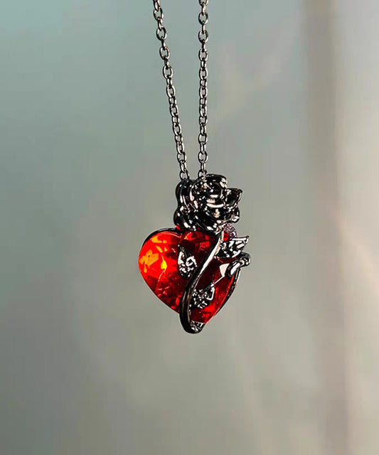 Collier pendentif original en cuivre noir surdoré avec zircon rose Love - TrendAura