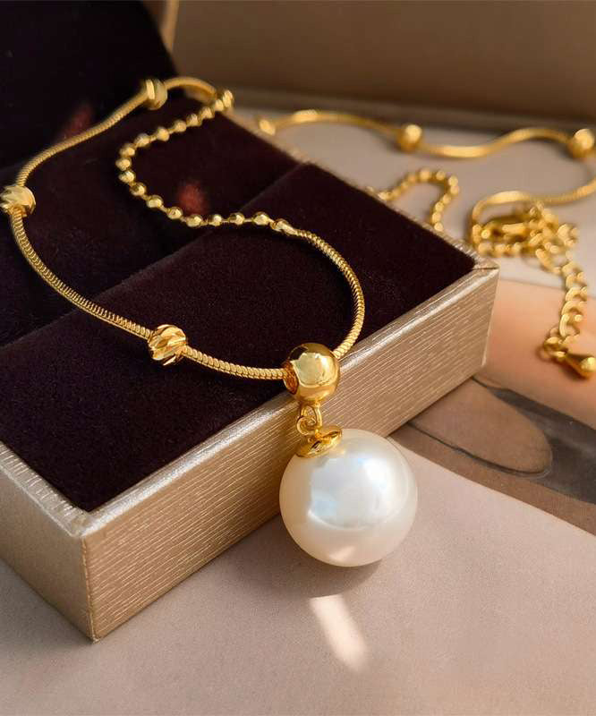 Collier avec pendentif en alliage de cuivre doré et perle au design original - TrendAura