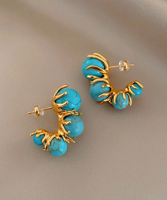 Boucles d'oreilles créoles originales en perles turquoise et cuivre doré - TrendAura