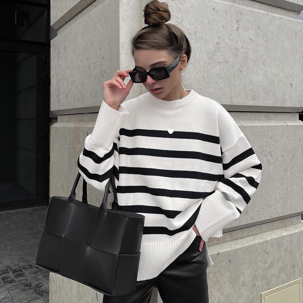Warm women's striped oversized pullover for autumn and winter