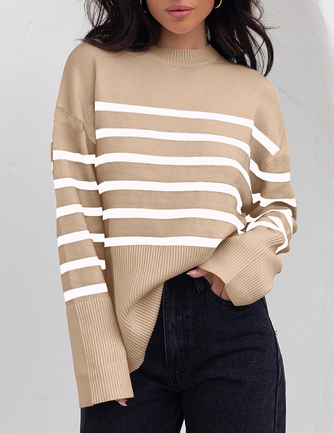 Warm women's striped oversized pullover for autumn and winter