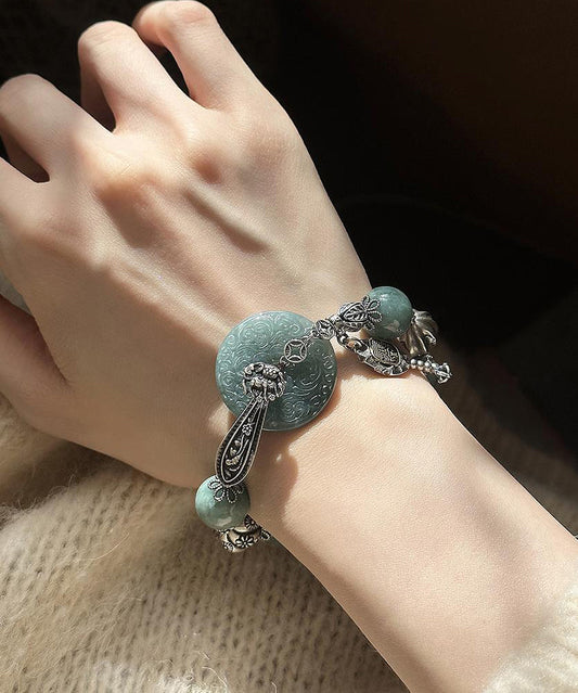 Bracelet à breloques papillon en argent sterling vert noirâtre rétro avec jade - TrendAura
