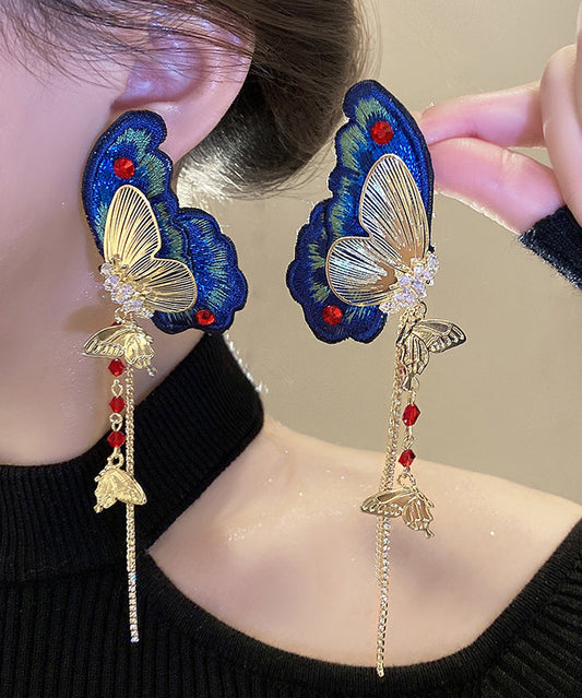 Boucles d'oreilles pendantes rétro en argent sterling bleu, alliage de zircon, tissu brodé de papillons et pompons - TrendAura