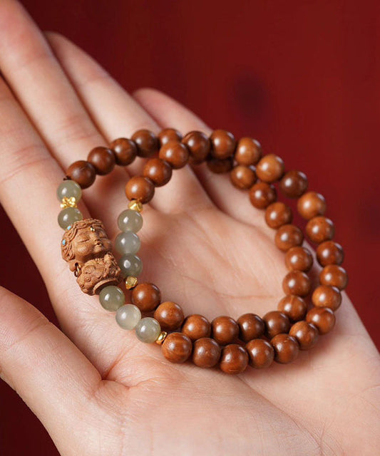 Bracelet rétro en perles de bois de santal et jade marron surdoré - TrendAura