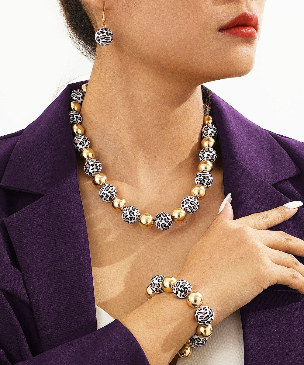 Ensemble de trois boucles d'oreilles pendantes rétro léopard, bracelet chaîne et collier pendentif - TrendAura