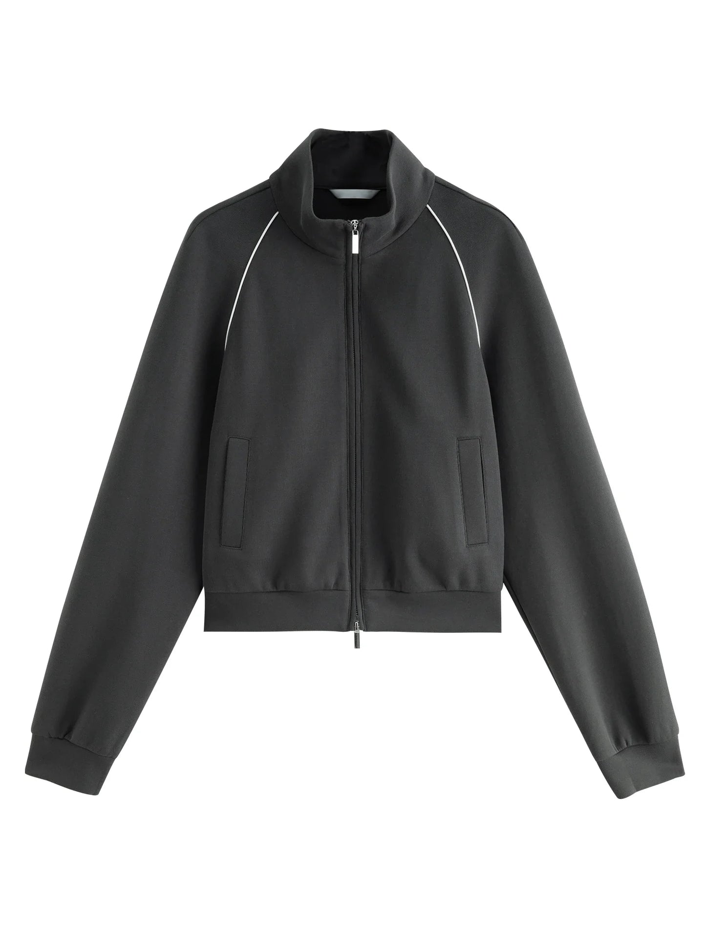 Sporty women's outfit with contrasting cropped jacket and comfortable pants