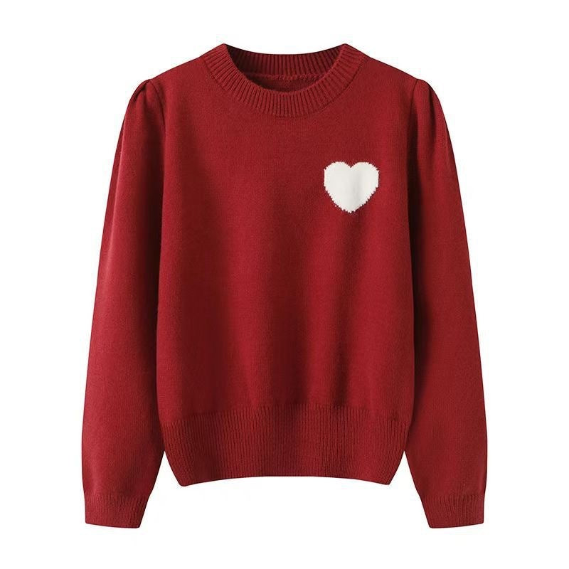 Women's knitted sweater with heart details