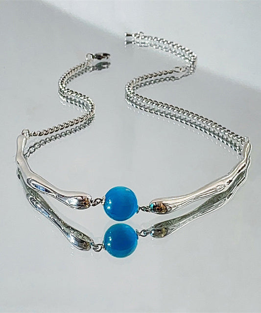 Collier avec pendentif en perles rondes en acier inoxydable bleu - TrendAura