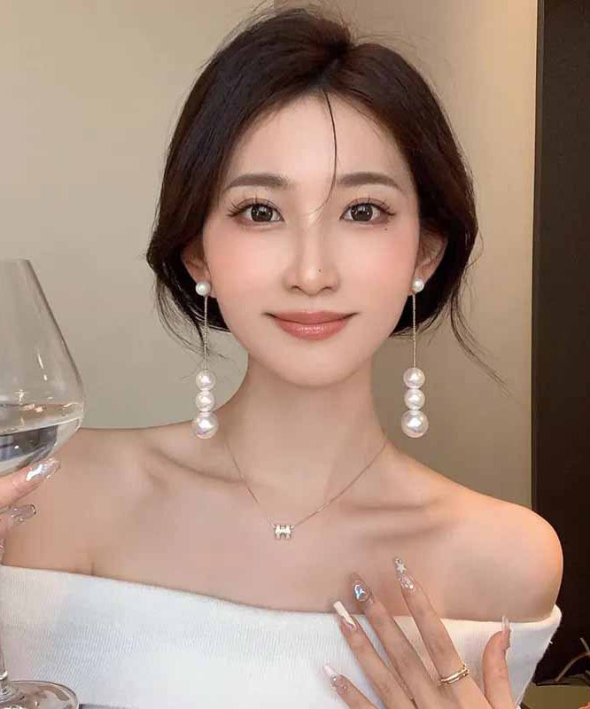 Boucles d'oreilles pendantes élégantes en alliage d'or avec perles - TrendAura