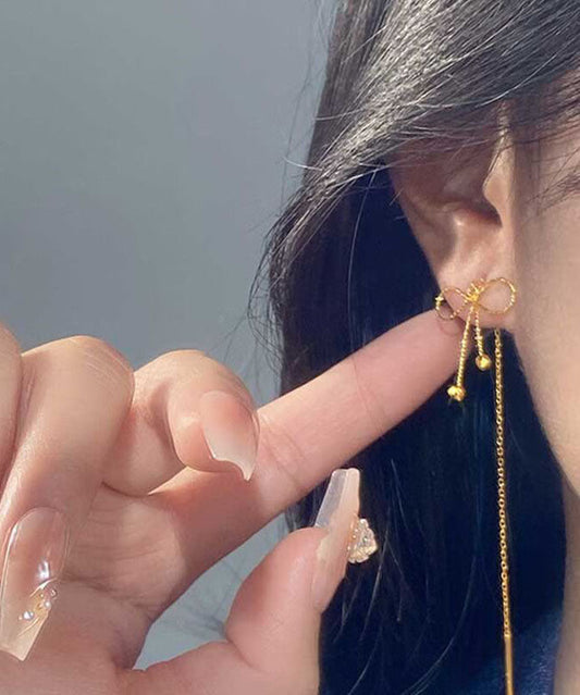 Boucles d'oreilles pendantes élégantes en argent sterling doré avec nœud - TrendAura