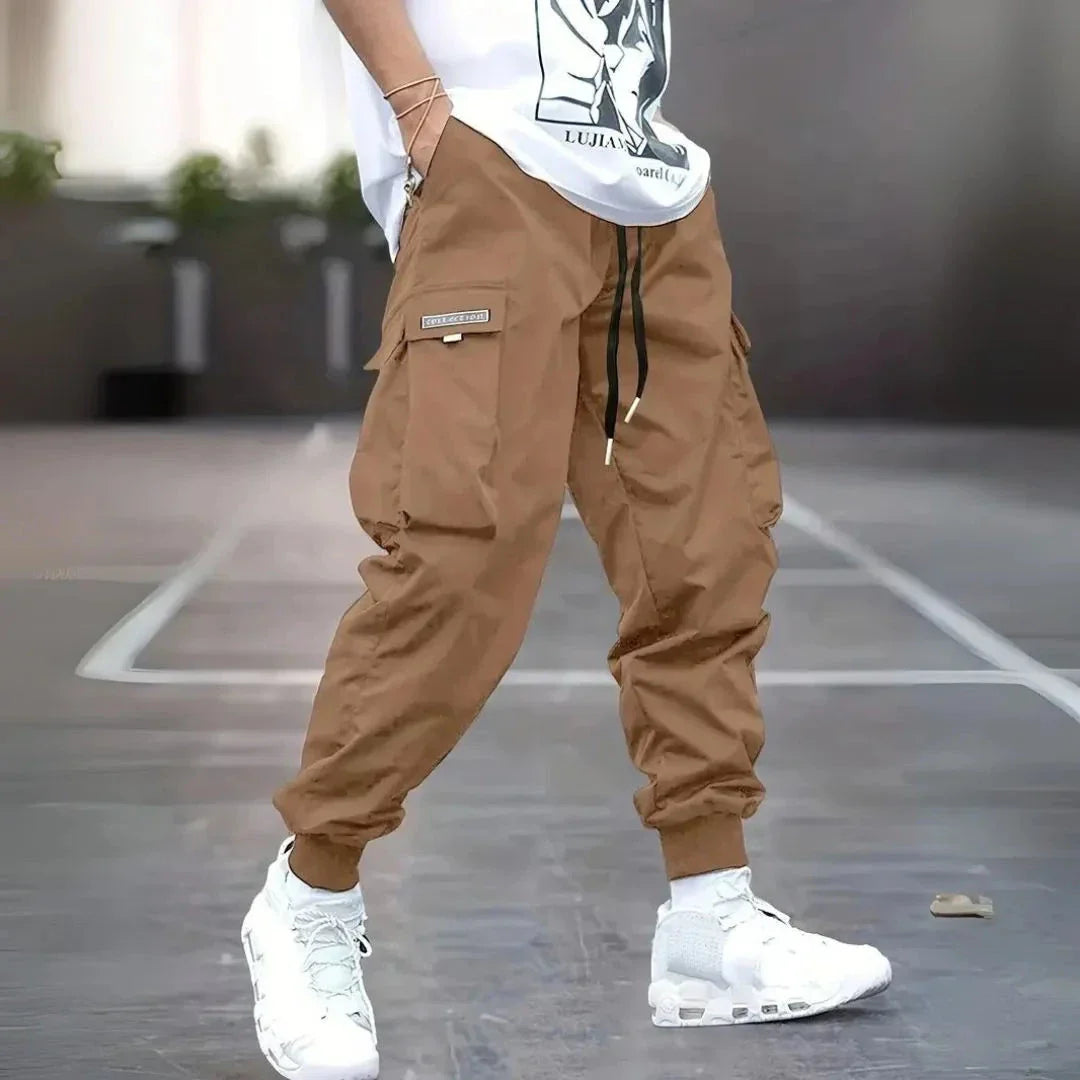 Waylynn Tom Utility Cargo Joggers With Adjustable Drawstring Waist Tapered Streetwear Fit And Multiple Cargo Pockets