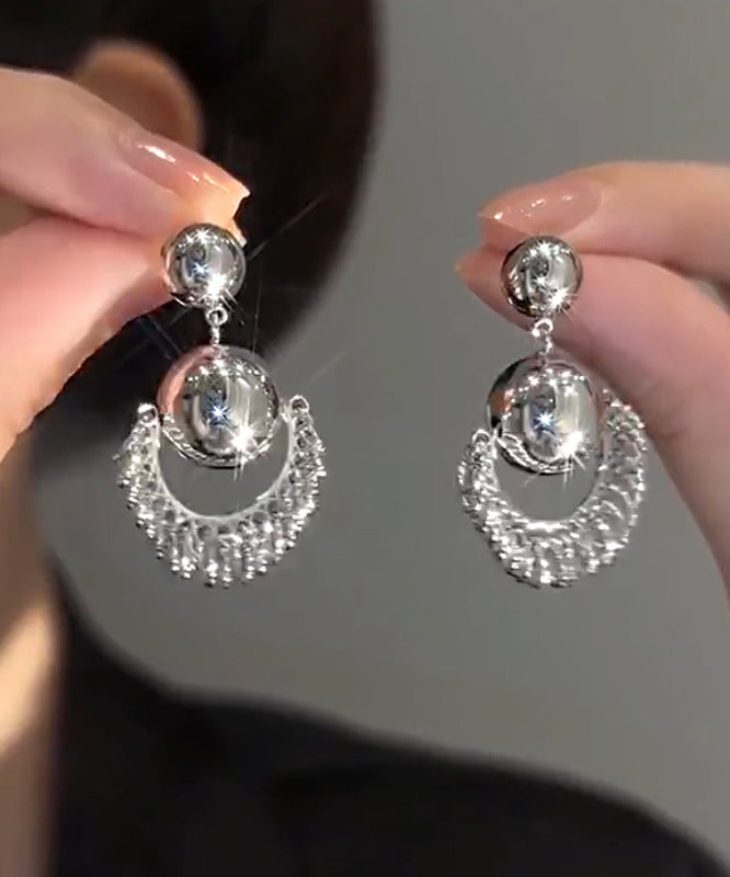 Boucles d'oreilles pendantes uniques en argent et soie Stergild - TrendAura