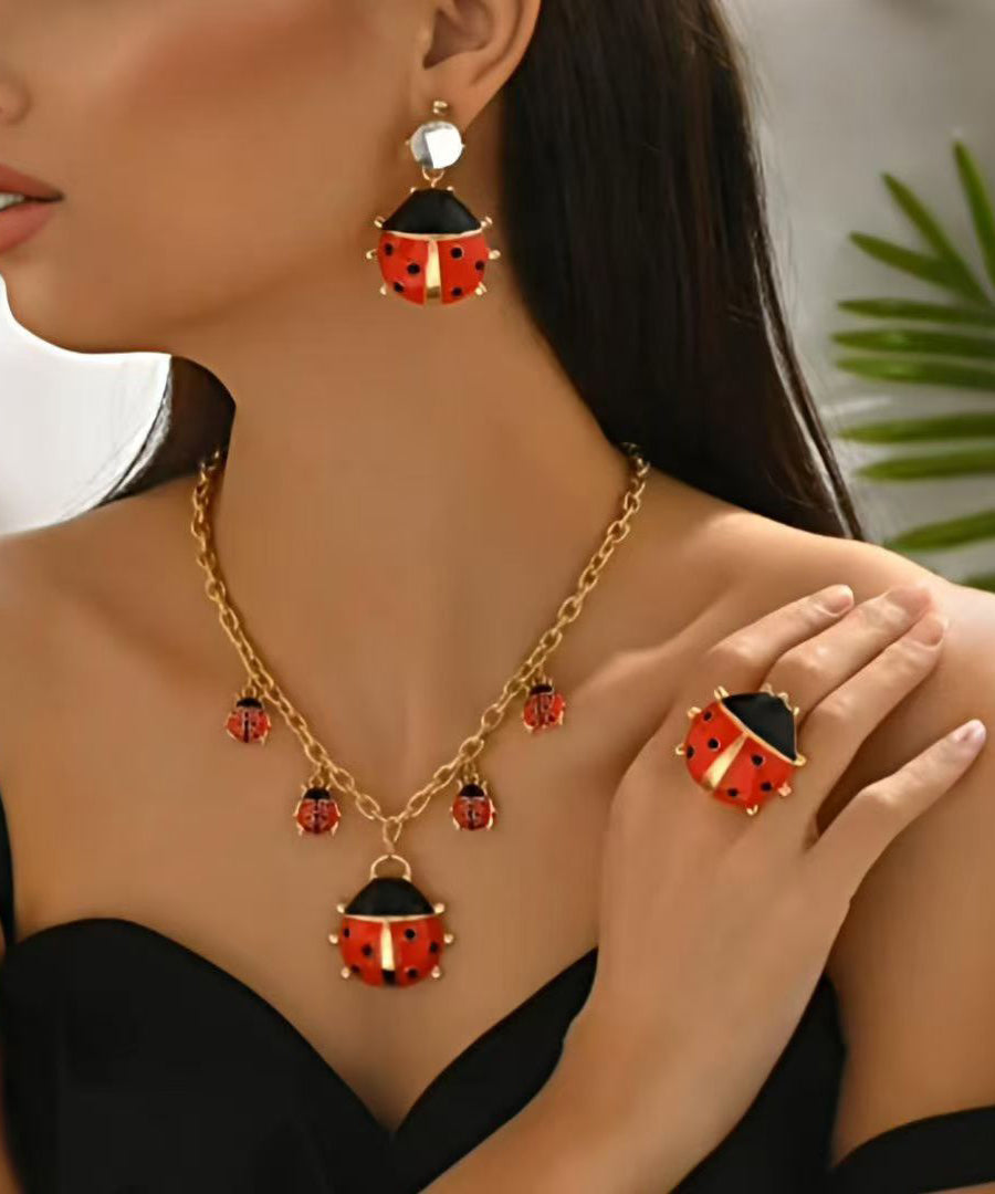 Ensemble unique de trois boucles d'oreilles pendantes, bagues et collier pendentif en alliage d'acier inoxydable - TrendAura