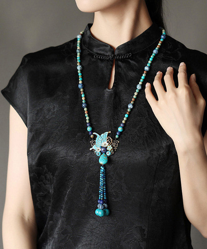 Collier pendentif papillon coquillage turquoise en alliage vintage - TrendAura
