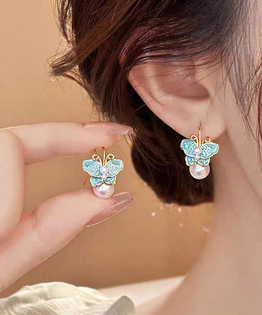 Boucles d'oreilles à tige vintage en alliage de cuivre bleu avec perles et papillon en émail - TrendAura