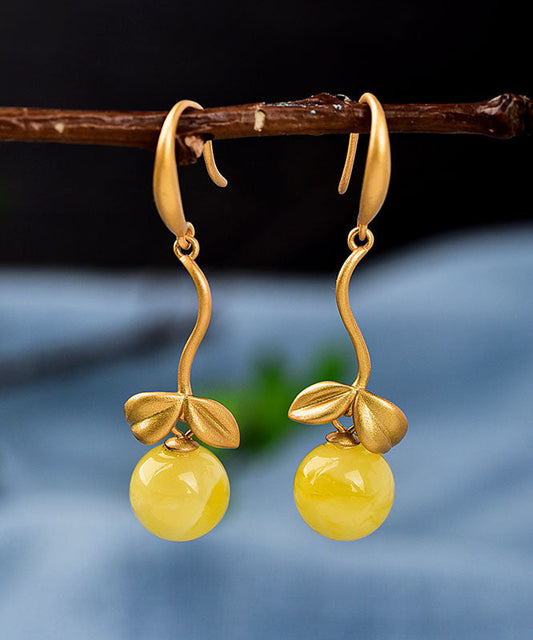 Boucles d'oreilles pendantes vintage en argent surmonté d'or et de cire d'abeille. - TrendAura