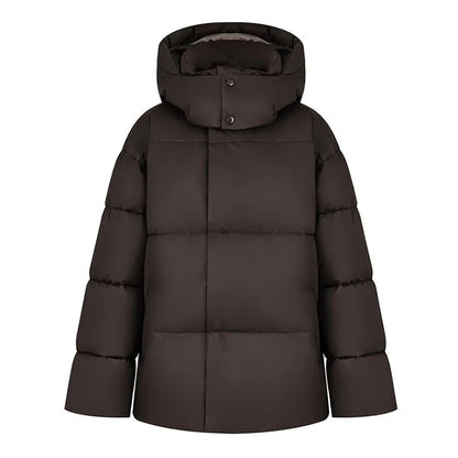 Warm long women's winter jacket made of cotton with hood and stand-up collar