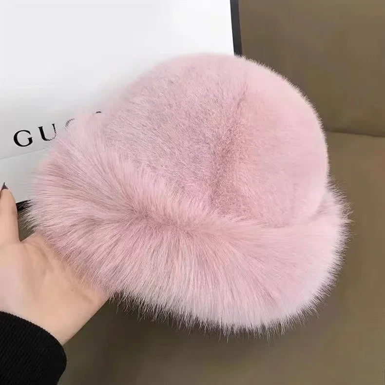 Warmer women's fur hat made of faux fur for autumn and winter
