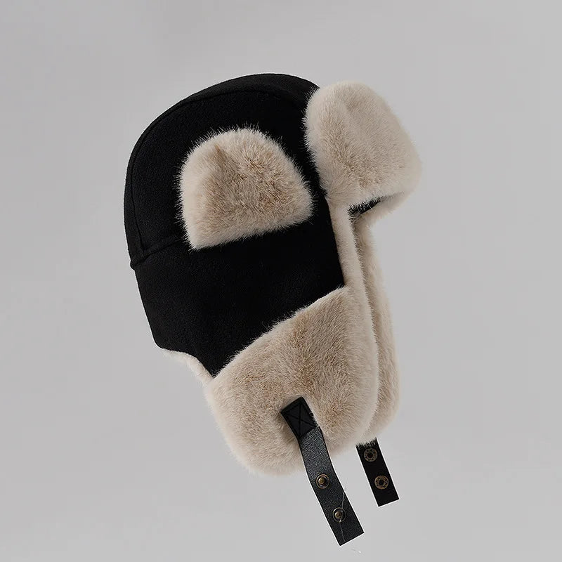 Warm women's hat made of faux fur