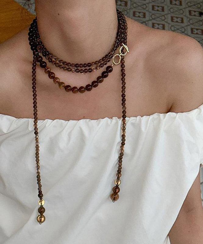 Collier de perles graduées en cuivre doré chocolat pour femme - TrendAura