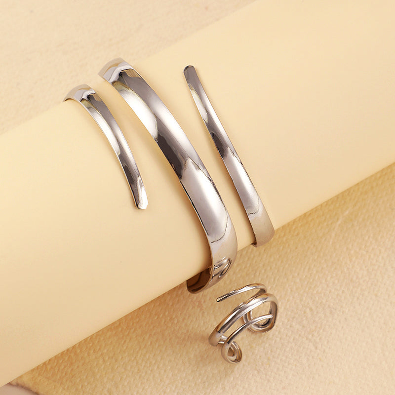 Sculpted Wrap Bracelet And Ring Set For Women With Open Curve Design And Fluid Contours
