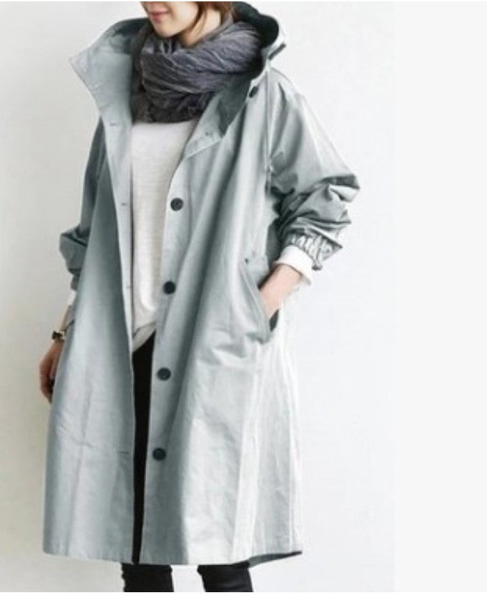 Women's coat with hood and button closure