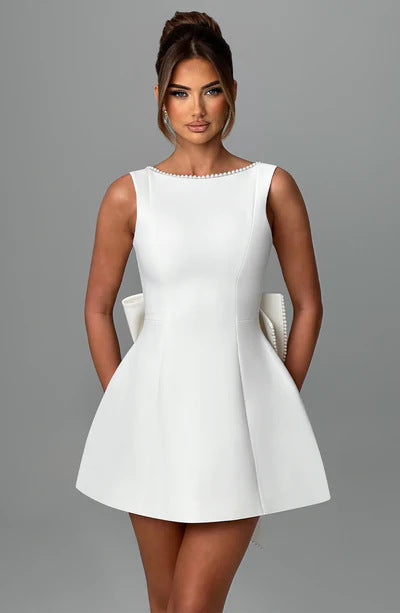Priscella Elegant Cocktail Mini Dress For Spanish Women, Flared Silhouette With Pearl Accents, Effortless Sophistication